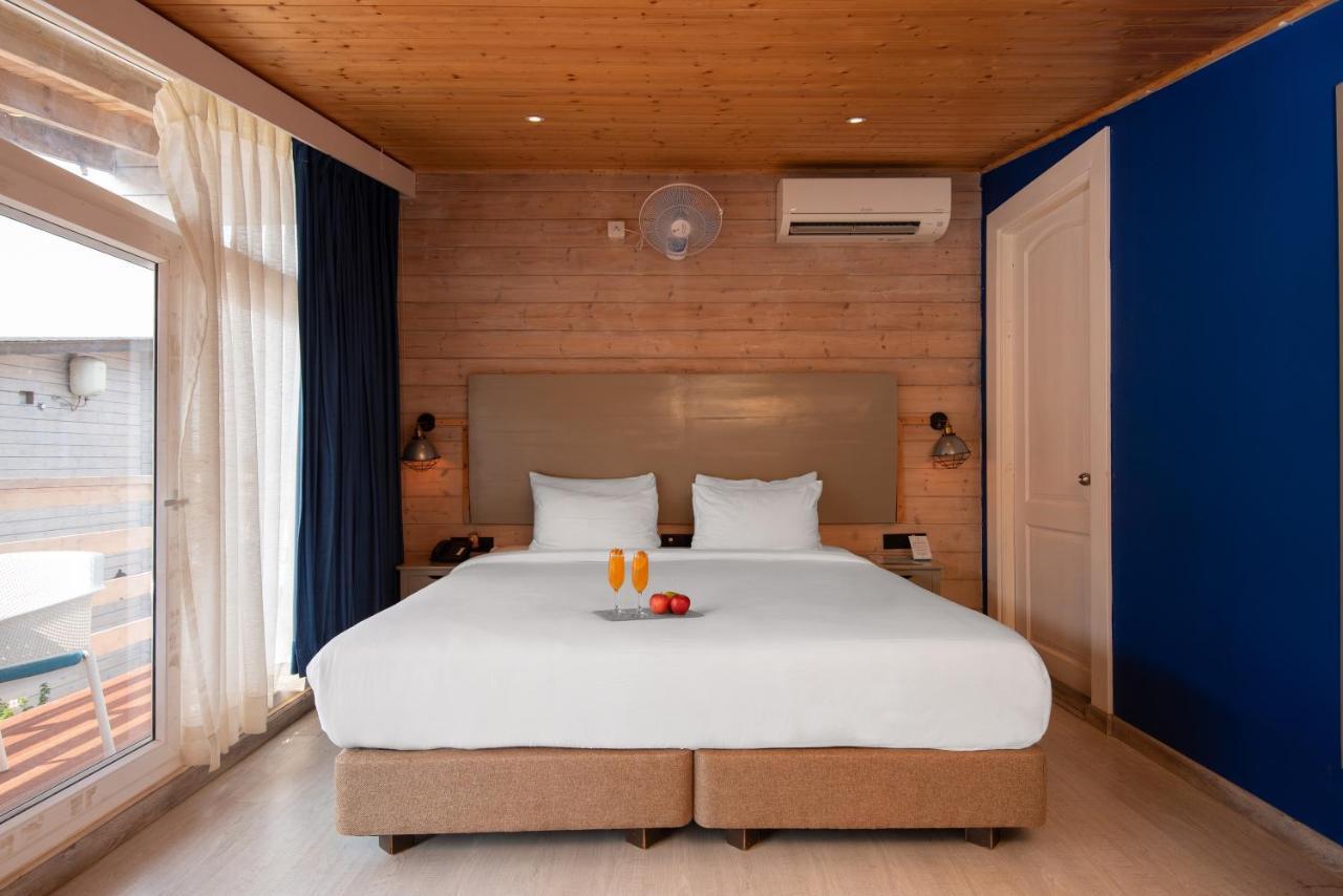 Living Room Beach Resort Morjim Bagian luar foto