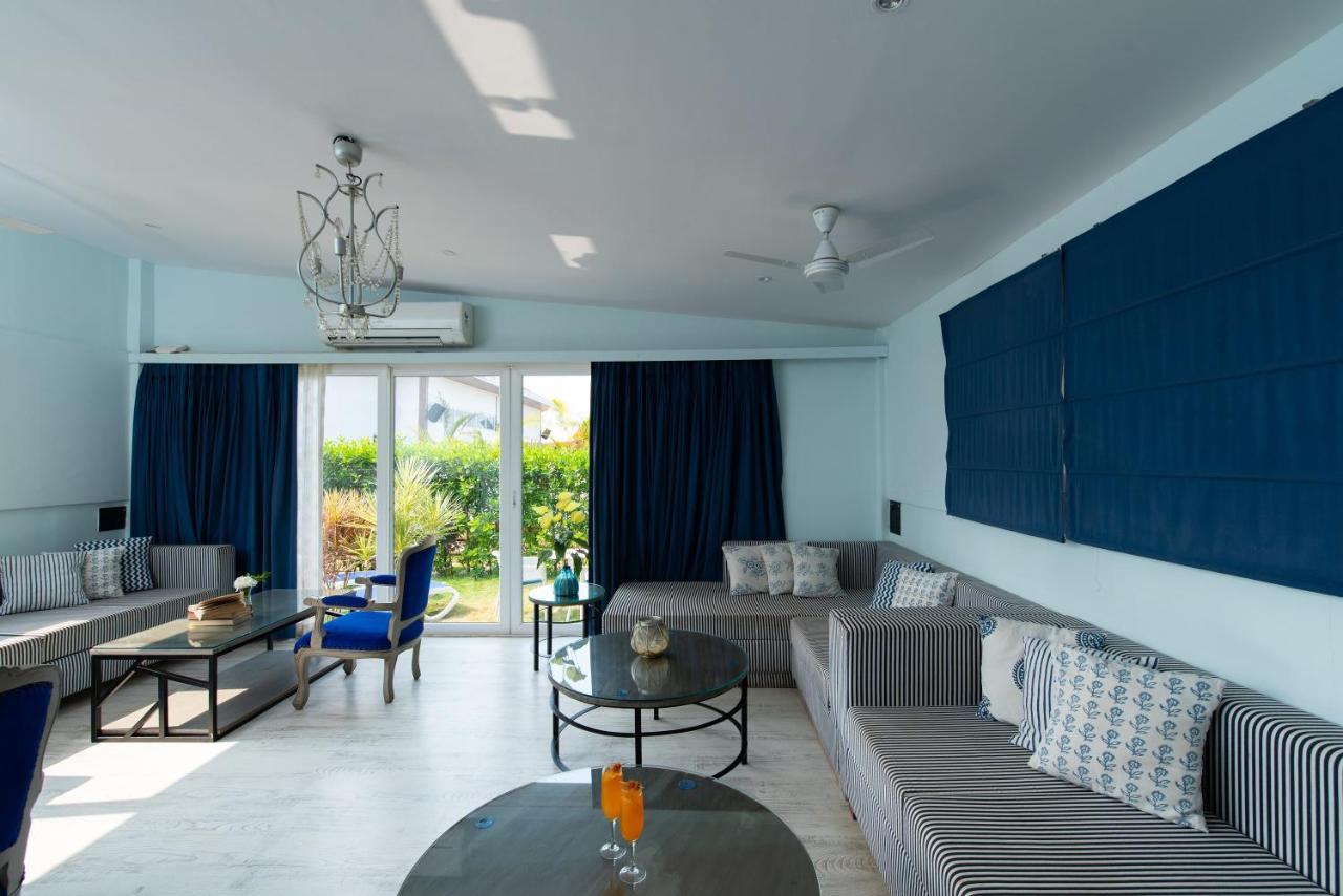 Living Room Beach Resort Morjim Bagian luar foto